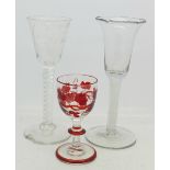 Two early 19th Century glass wines with twist stems and one with etched bowl, both a/f,