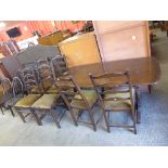 An Ercol refectory table and six chairs