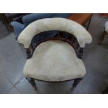 A Victorian mahogany and upholstered tub chair
