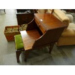 A mahogany telephone table with stool