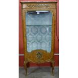 A French Louis XV style kingwood, ormolu mounted and marble topped vitrine by Paul Sormani,