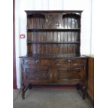 A carved oak dresser