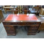 A mahogany pedestal desk