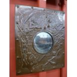 An Arts and Crafts copper mirror,