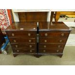 A pair of mahogany bedside chests