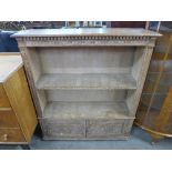 A limed oak open bookcase