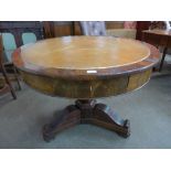 A Beidermeier style mahogany drum library table
