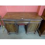 An early Victorian mahogany pedestal sideboard