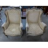 A pair of French Louis XV style carved giltwood and upholstered fauteuils