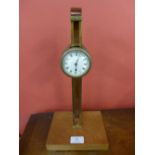 An early 20th Century mahogany gravity clock