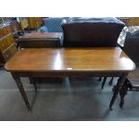 A Victorian mahogany drop-leaf side table