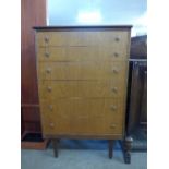 A Homeworth teak chest of drawers