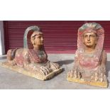 A pair of Egyptian Revival painted carved wood and composite sphinxes, 76cms h,