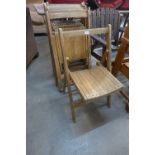 A set of seven folding chairs