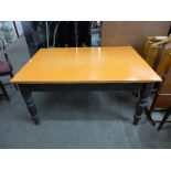 A Victorian pine kitchen table with Formica top