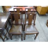 A set of four oak dining chairs