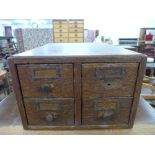An oak index drawer cabinet