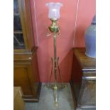 An Art Nouveau brass telescopic standard oil lamp