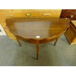 A mahogany demi lune hall table