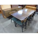 A Nathan tola wood eight piece dining suite