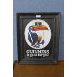 A reproduction Guinness advertising sign