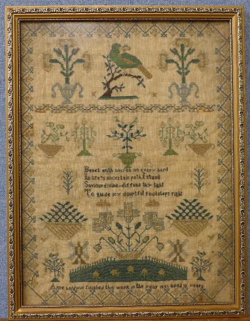 A Victorian sampler by Anne Baldwin, finished in the year 1841 aged 12 years, framed,