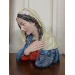 A hand painted plaster bust of the Virgin Mary