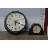 A Genalex Bakelite electric wall clock and an Ingersol Bakelite mantel clock