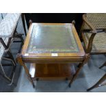 A yew wood and leather topped occasional table with single drawer