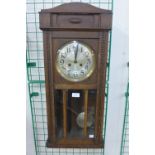 An Edward VII wall clock and three others