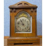 A small 19th Century continental walnut timepiece