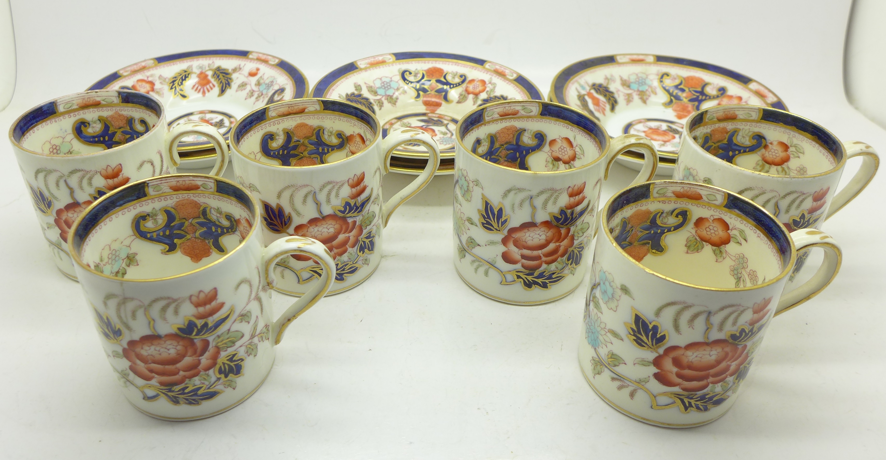 Six Crown Staffordshire coffee cans and saucers,