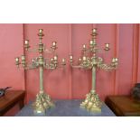 A pair of large French Empire style gilt bronze candelabra,