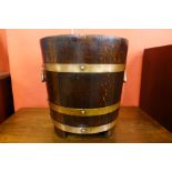 A coopered oak and copper coal bucket