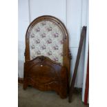 A Victorian figured walnut and upholstered three-quarter sized bed