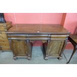 An early Victorian mahogany pedestal sideboard