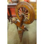 A mahogany spinning wheel