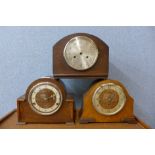 A walnut mantel clock and two oak mantel clocks