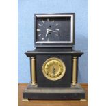 An early 20th Century oak mantel clock,