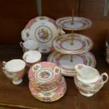 A Royal Albert Lady Carlyle teaset, six setting with three tier cake stand,