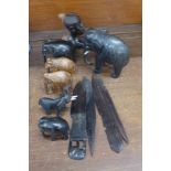 Four African carved letter openers,