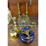 A pair of brass candlesticks, a stamp box, desk tidies, a tobacco jar, etc.