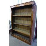 A Victorian oak open bookcase