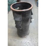 A terracotta chimney pot