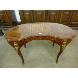 A 19th Century Italian exhibition quality marquetry inlaid kidney shaped centre table