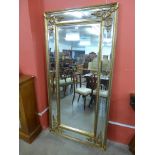 A large French style gilt mirror,