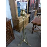 An Art Nouveau brass telescopic standard oil lamp