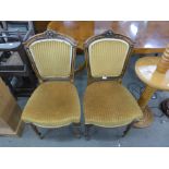 A pair of Victorian walnut chairs