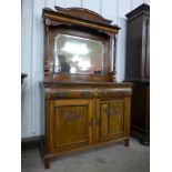 An Edward VII walnut mirrorback sideboard