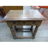 A 17th Century style joined oak coffin stool
